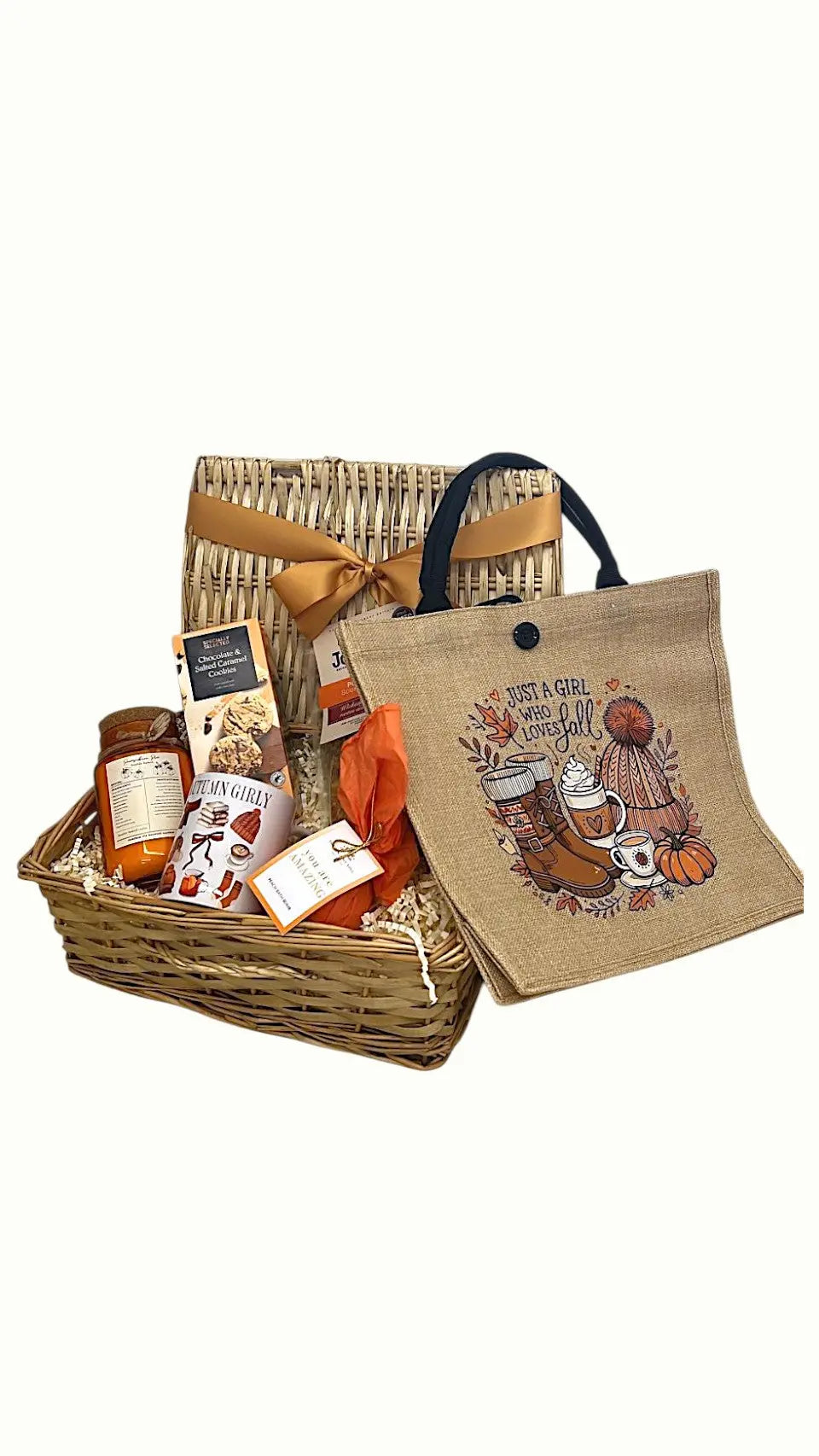 Gift basket with a decorative bag on a white background Autumn gifts for her Christmas cosy gifts