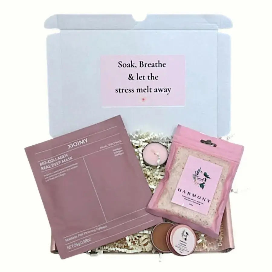 Harmony self-care kit with face sheet collagen mask, rose  lip balm and a candle 