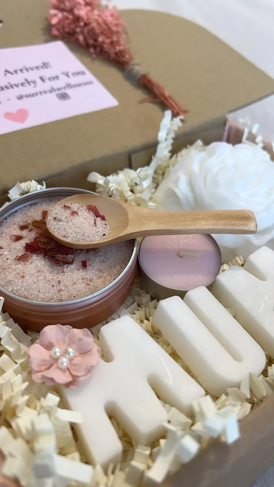 Christmas gift hamper for mum with festive chocolates, skincare, and pamper items