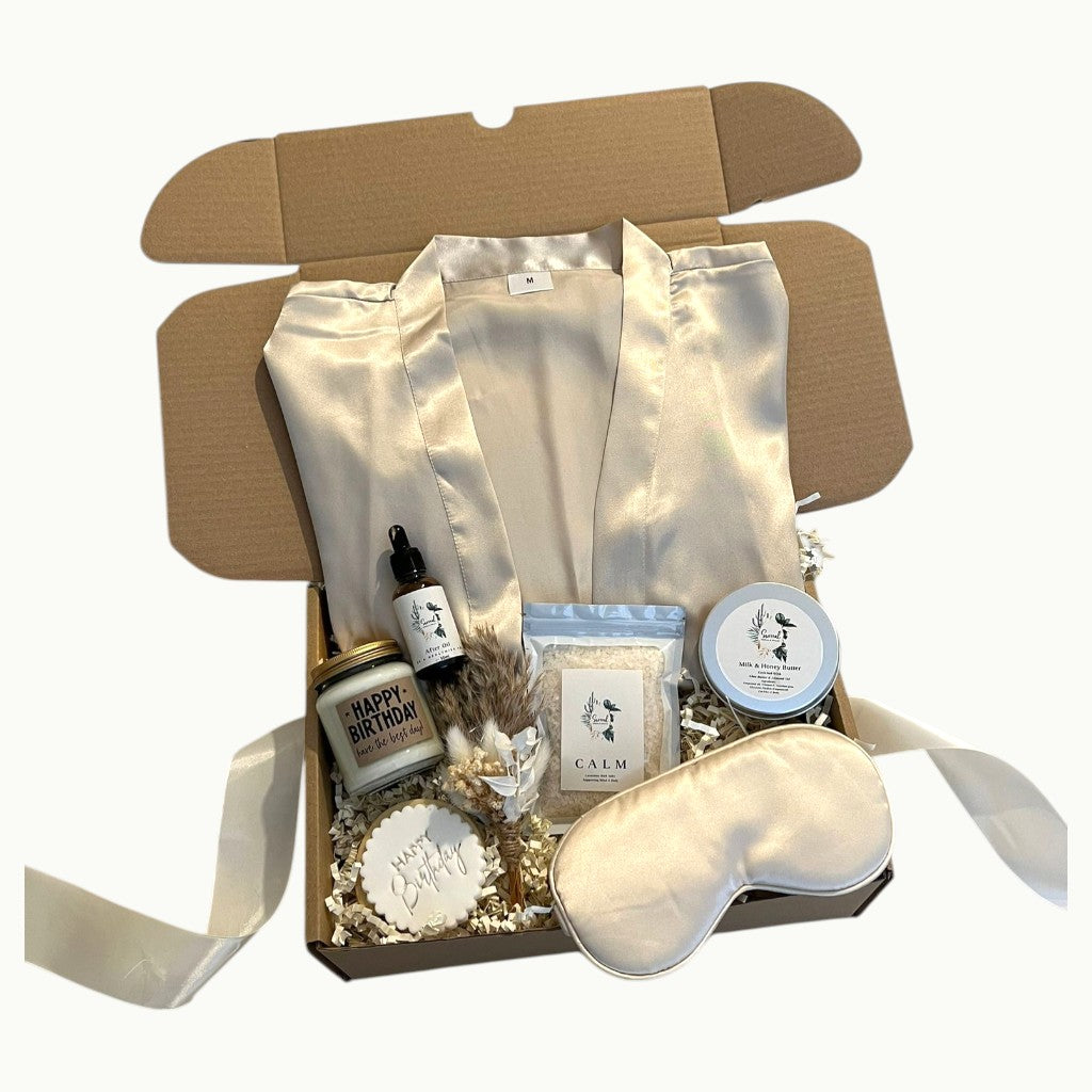 Pamper hamper with satin robe, skincare, candle, bath salts and personalised cookie in a self care gift box