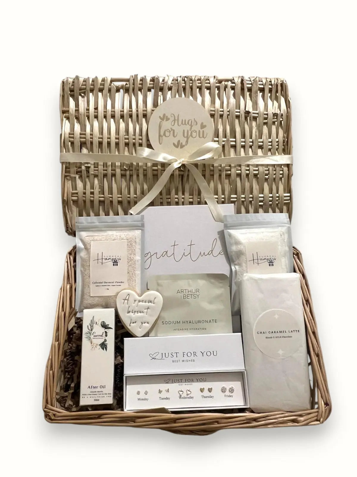 Women’s pampering gift basket with skincare, snacks, and Large Hugs For You themed packaging