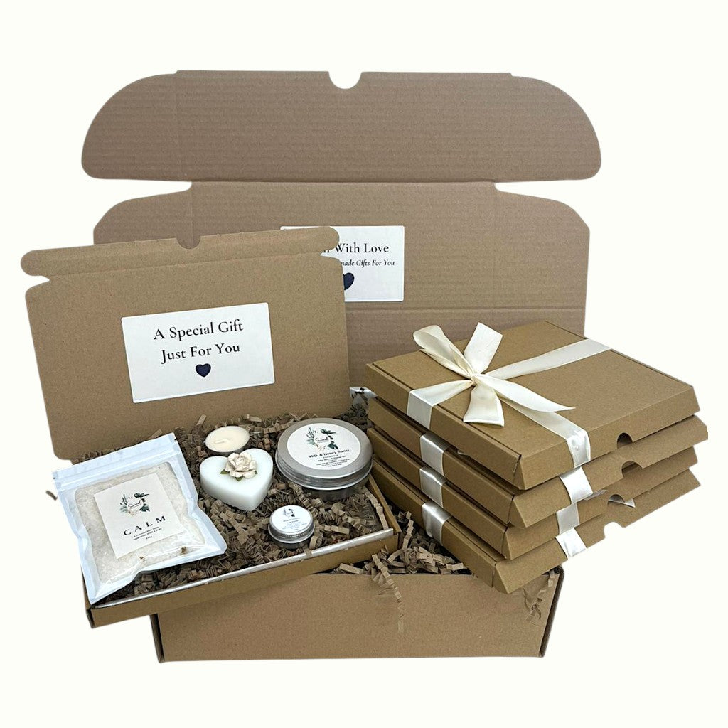4-in-1 pamper gift box by Surreal Hampers featuring handmade natural cream, Himalayan bath salts, tealight candle, and lip balm — perfect Christmas gift, birthday present, or girls’ night in self-care hamper for her UK.