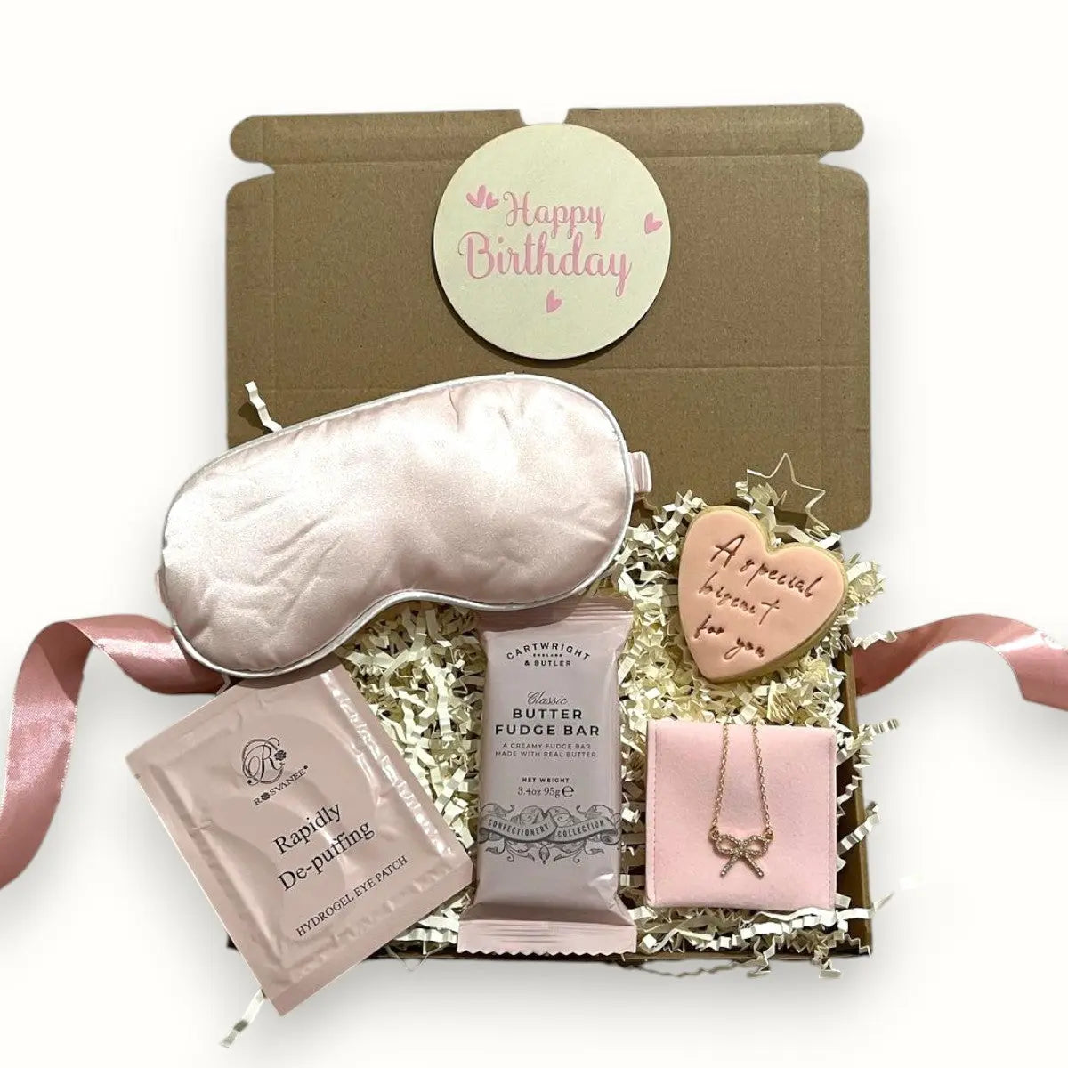 Customisable gift box with personalised message, skincare products, and indulgent treats Surreal Hampers UK