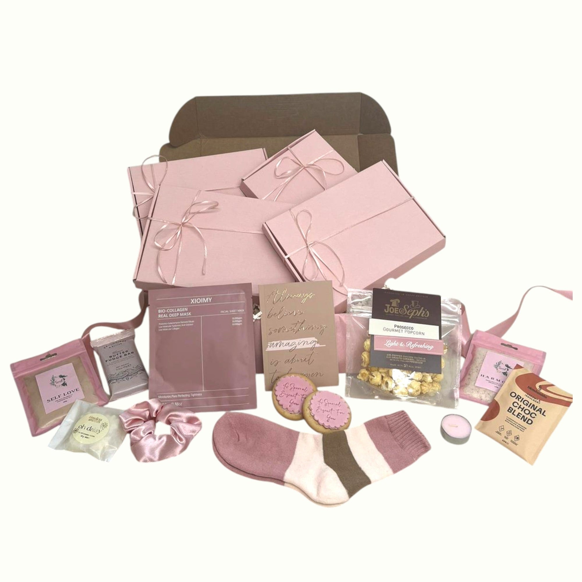 Pamper hamper basket with four mini gift boxes for Christmas or birthdays