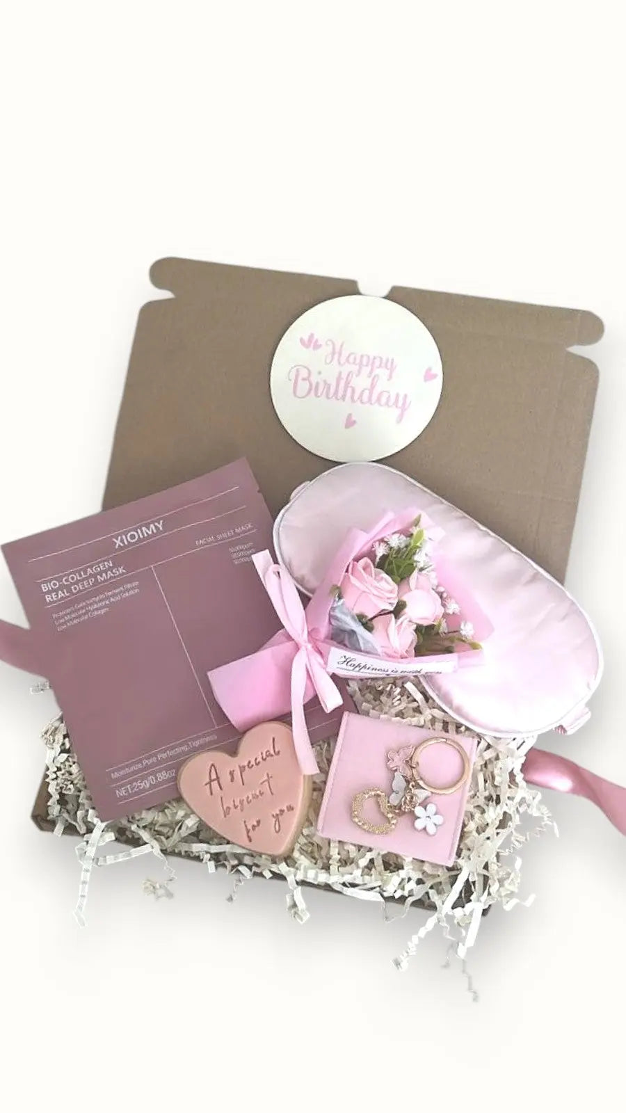 Personalised birthday letter box gifts for women with skincare, bath products, and indulgent treats