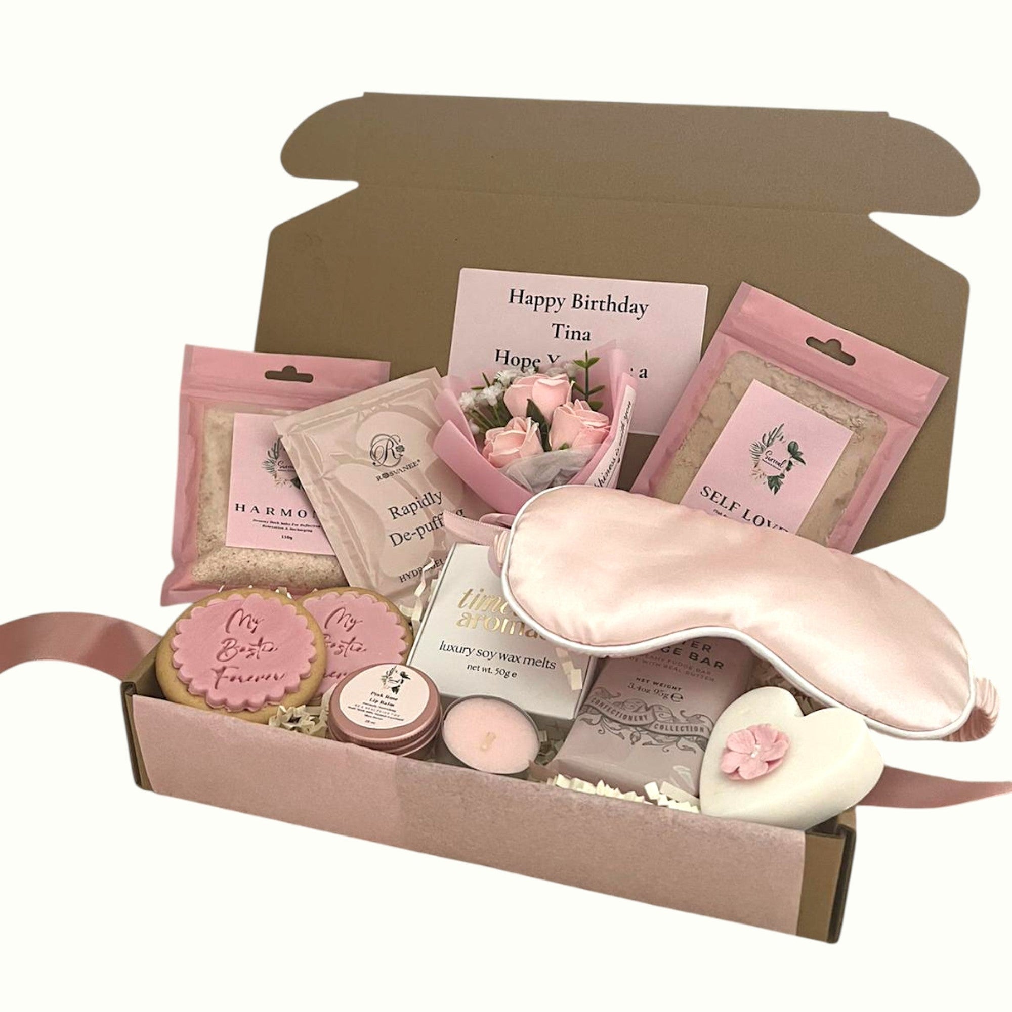 Cosy pamper gift box for her with skincare, candle, and treats for Christmas or birthday