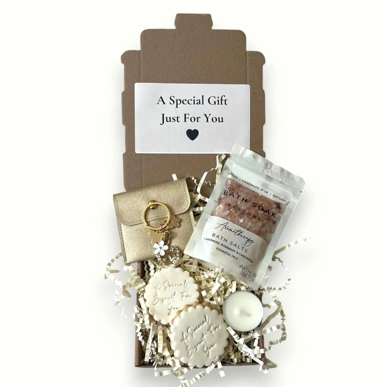 Small luxury hamper including bath salts, cookies, and a keyring – perfect cosy gift