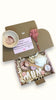 Mum’s birthday gift box with skincare, pampering treats, and indulgent bath products