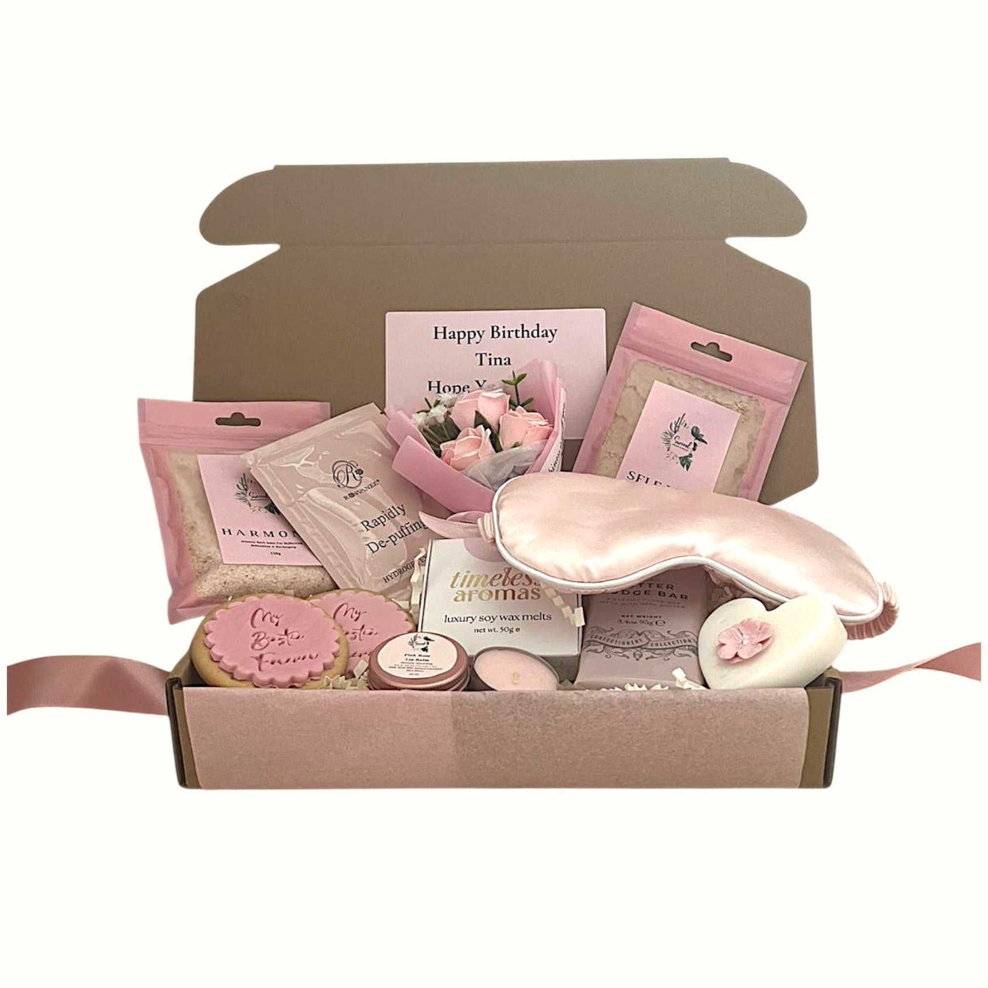 Cosy pamper gift box for her with skincare, candle, and treats for Christmas or birthday