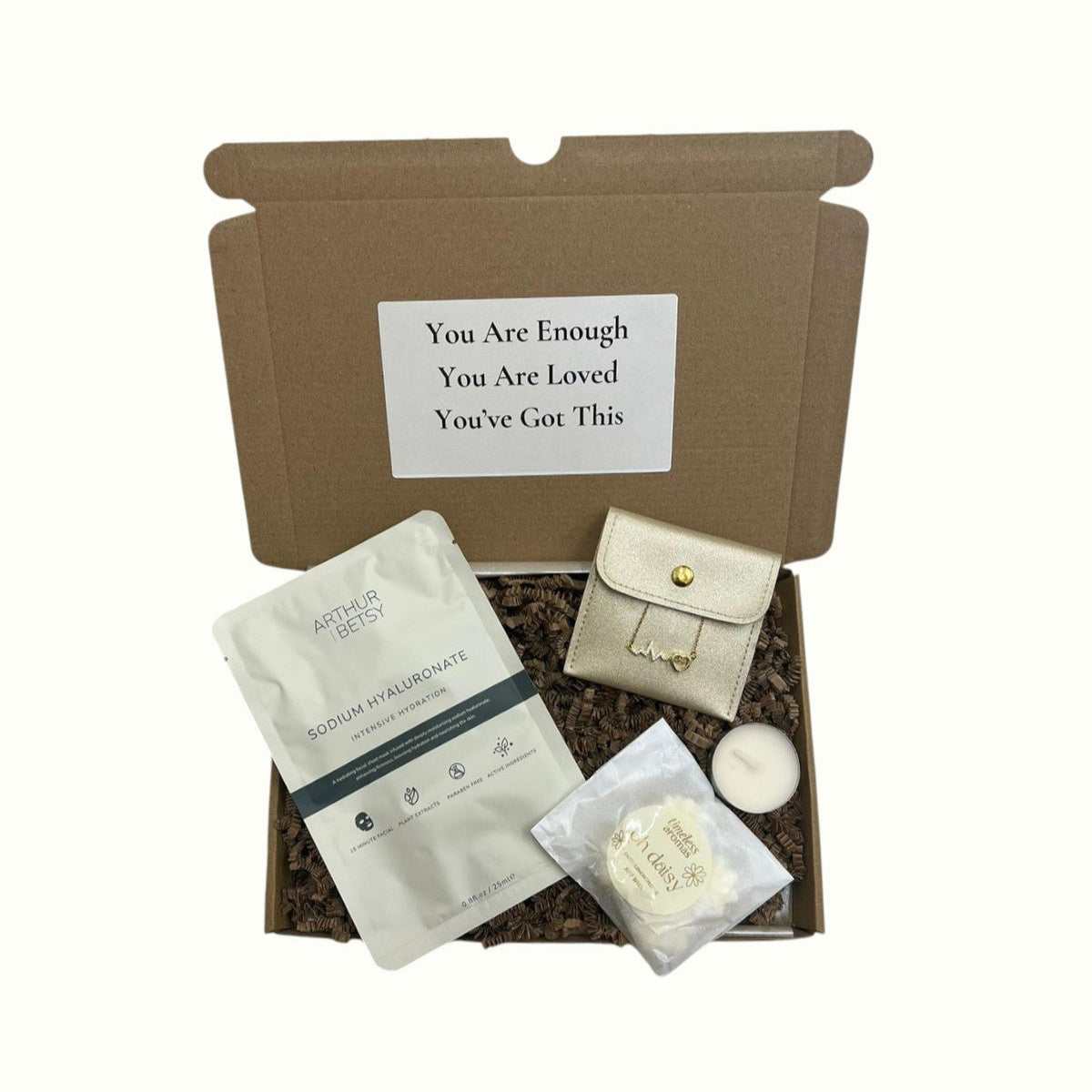 Giftbox with face mask, wax melts, candle and love heart jewellery Surreal Hampers 