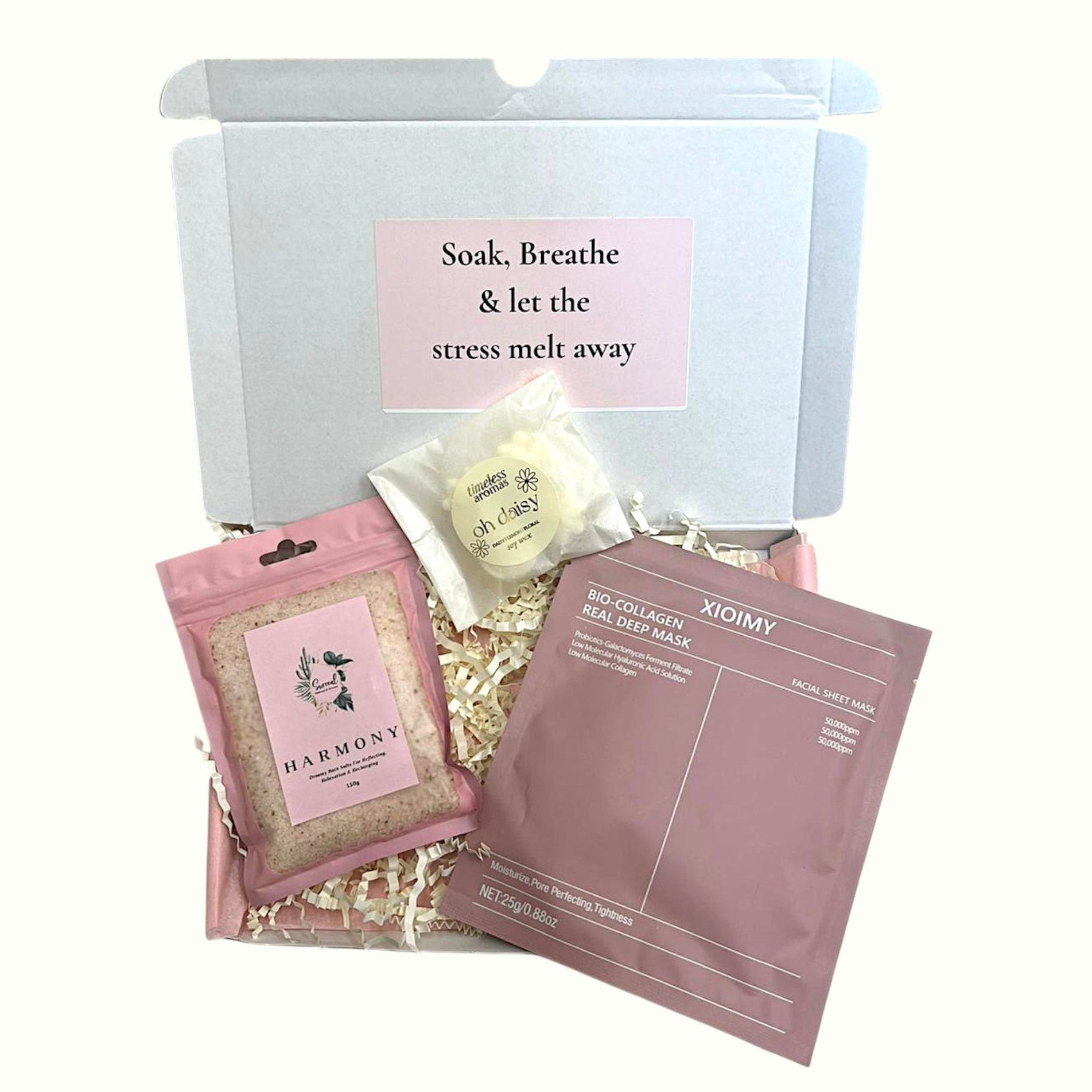 Luxury 4-in-1 gift hamper with mini boxes of skincare and treats for her